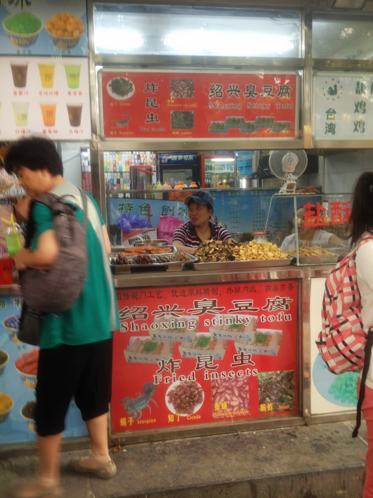 Nom nom!  Fried insects and stinky tofu...it»s hard to choose