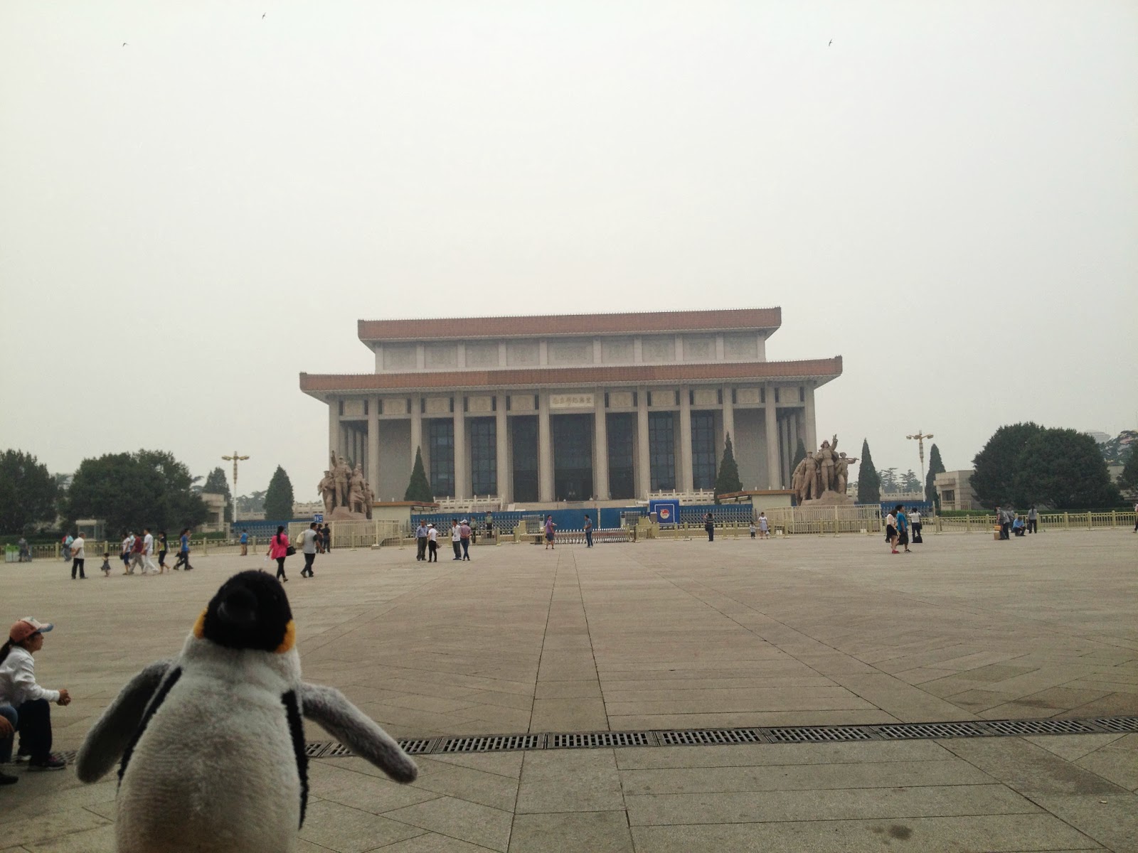 Penguin in front of the "Mao-soleum"