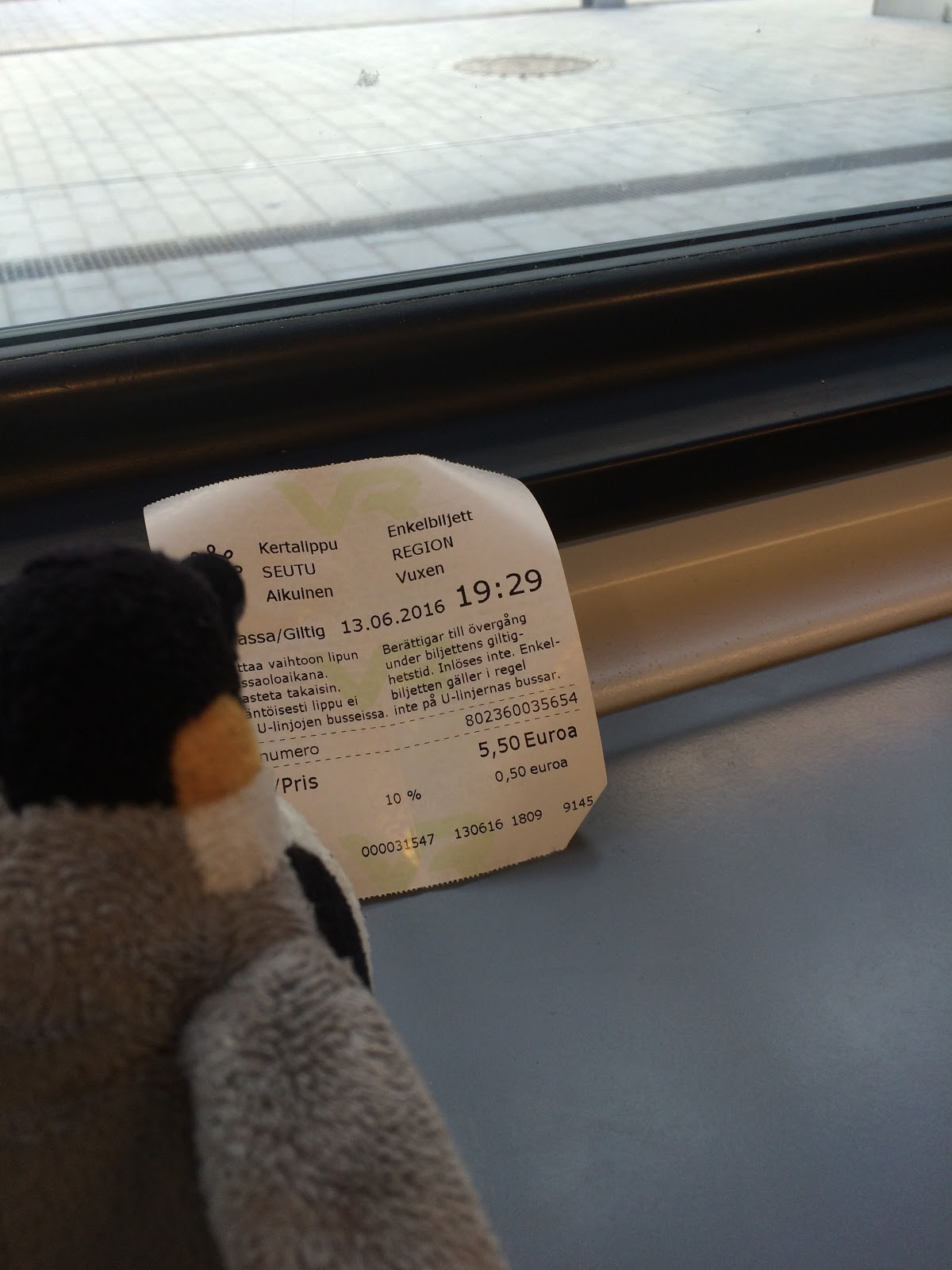 Travel tries to read a Finnish train ticket